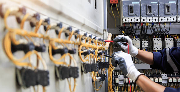 Professional Electrician technician working in Bay Minette, AL